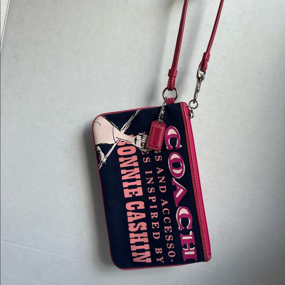 Coach wristlet 
COACH Bonnie Cashin Wristlet w/framed coin purse. Pink blue